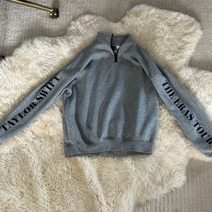 A medium Taylor swift Eras Tour zip up
